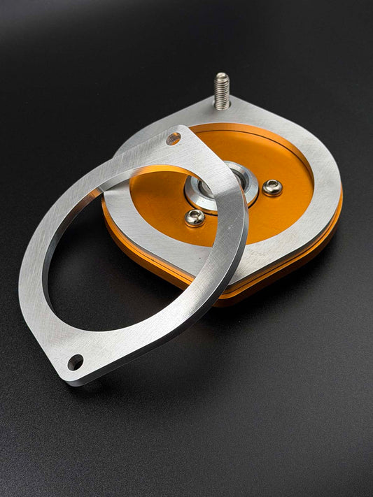 detailed picture of topmount spacer sitting on ohlins topmount